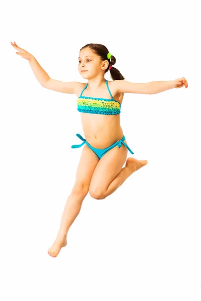 Pequena Menina Caucasiana Anos Idade Trajes Banho Multicoloridos Cianos Pulando — Fotografia de Stock