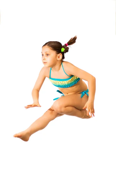 Pequena Menina Caucasiana Anos Idade Trajes Banho Multicoloridos Cianos Pulando — Fotografia de Stock