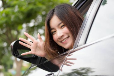 thai adult working women white shirt in car