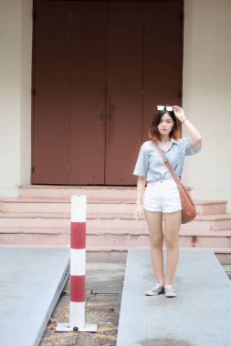 Portrait of thai adult beautiful girl short hair relax and smile