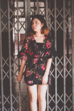 Portrait of thai adult beautiful girl short hair relax time, in Vintage Style