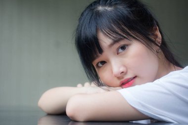 asia thai japanese teen teen White t-shirt beautiful girl happy and relax