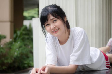 asia thai japanese teen teen White t-shirt beautiful girl happy and relax