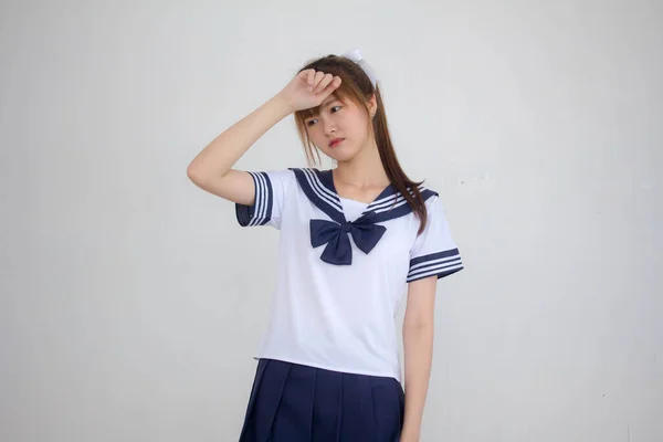 タイ人ティーン美しいです女の子で日本語学生制服 Think — ストック写真