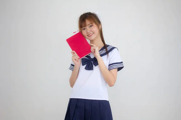 Азиатско Тайский Подросток Красивая Девушка Японской Студенческой Форме Читать Книгу — стоковое фото