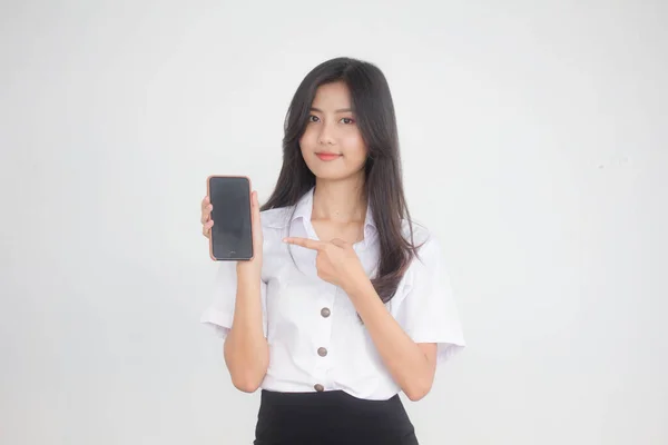 대학생의 제복을 아름다운 소녀의 모습이 스마트폰을 — 스톡 사진