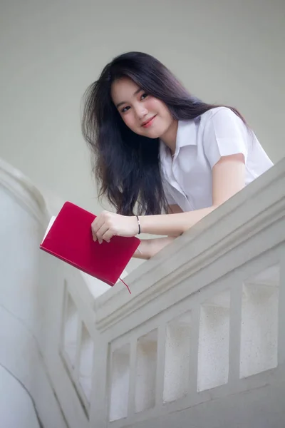 thai adult student university uniform beautiful girl relax and smile