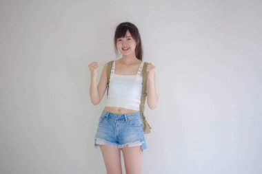 Güzel Taylandlı kız turistler İskoç beyaz gömlek mavi kot mükemmel.