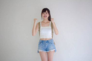 Güzel Taylandlı kız turistler İskoç beyaz gömlek mavi kot mükemmel.