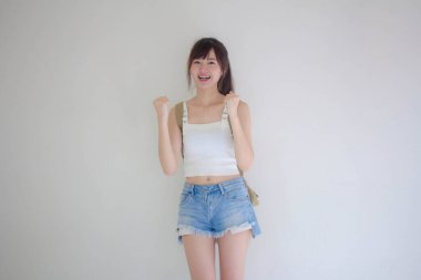 Güzel Taylandlı kız turistler İskoç beyaz gömlek mavi kot mükemmel.