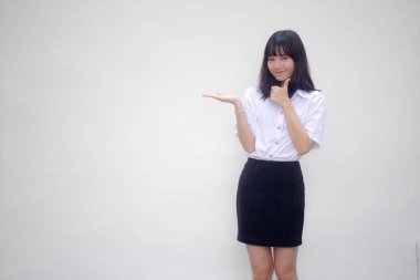 Taylandlı yetişkin üniversite üniforması güzel kız elini göster.