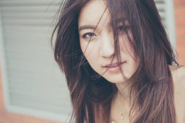 Tayland portresi yetişkin güzel kız rahatla ve gülümse