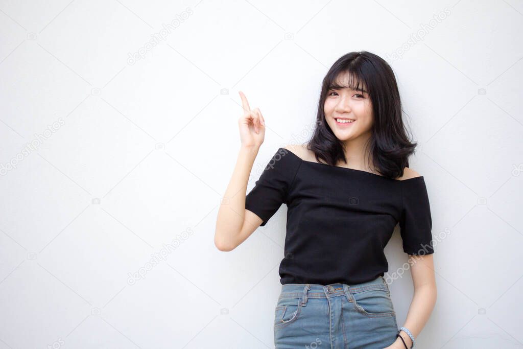 Portrait of thai vietnam teen beautiful girl pointing