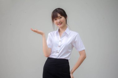 Taylandlı yetişkin üniversite üniforması güzel kız elini göster.