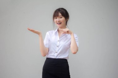 Taylandlı yetişkin üniversite üniforması güzel kız elini göster.