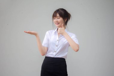 Taylandlı yetişkin üniversite üniforması güzel kız elini göster.