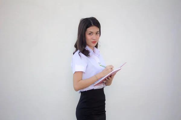 Thai Adult Student University Uniform Beautiful Girl Write Book — стоковое фото