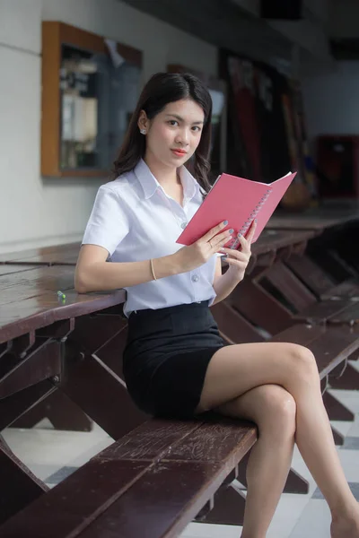 Thai Adult Student University Uniform Beautiful Girl Read Red Book — Stock Photo, Image