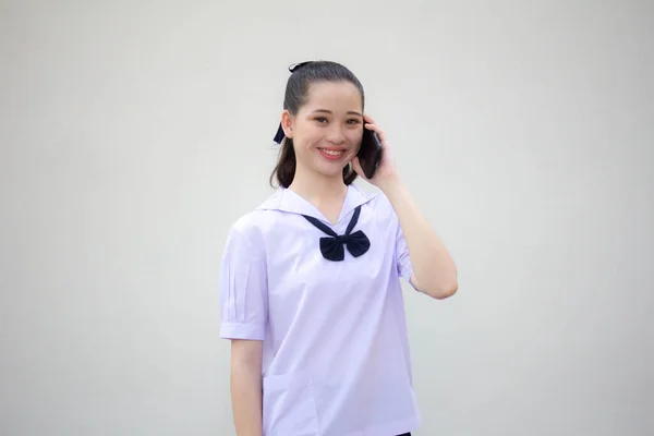 asia thai Junior high school student uniform beautiful girl calling smartphone