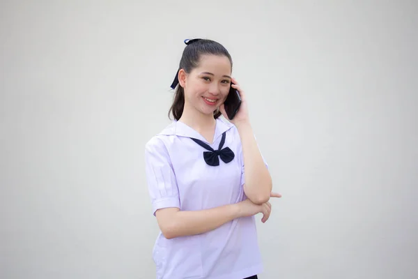 asia thai Junior high school student uniform beautiful girl calling smartphone