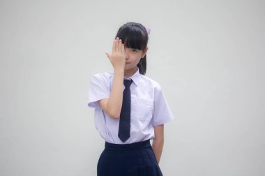 Tayland ortaokul üniforması portresi. Güzel bir kız değil.