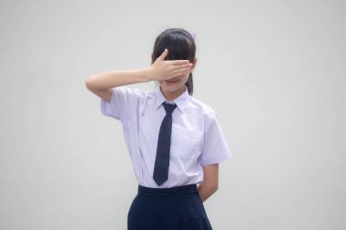 Tayland ortaokul üniforması portresi. Güzel bir kız değil.