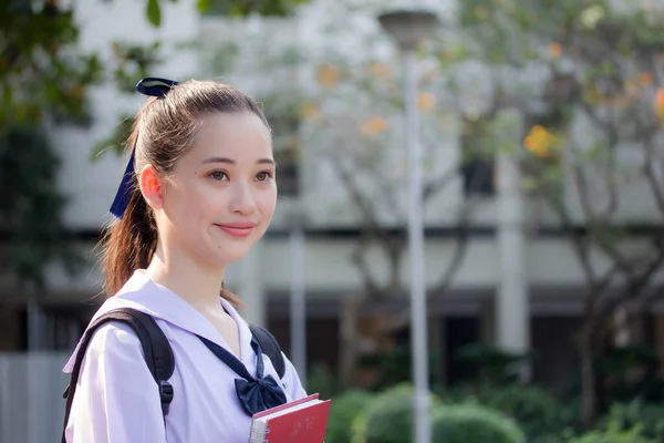 asia thai Junior high school student uniform beautiful girl smile and relax