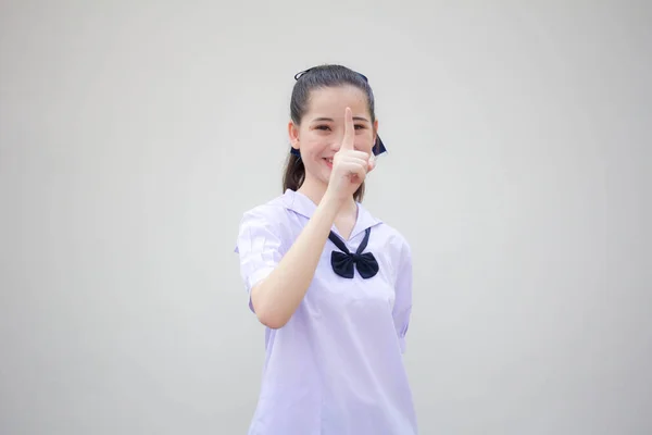 Asya Thai Ortaokulu Öğrencisi Üniforması Güzel Kız Işaret Ediyor — Stok fotoğraf