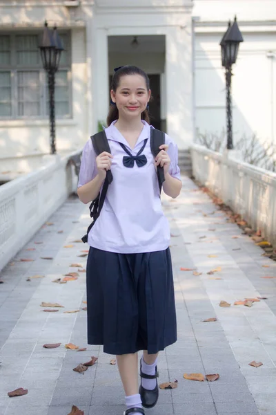 asia thai Junior high school student uniform beautiful girl smile and relax