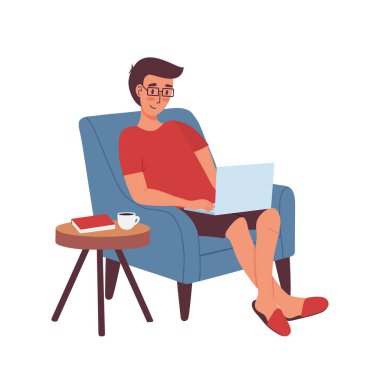 Dizüstü bilgisayarı olan genç adam ev sandalyesinde çalışıyor.