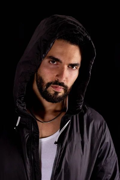 Dramatic Medium Shot Handsome Bearded Man Wearing Dark Hood Black Stock Picture