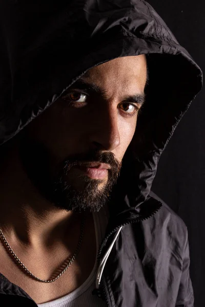 Dramatic Portrait Handsome Bearded Man Wearing Dark Hood Low Light Stock Image
