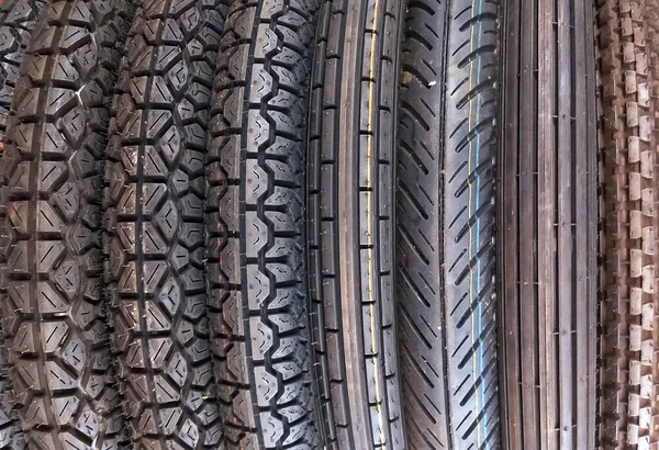Bike tyre stacked. Tyre pattern background.