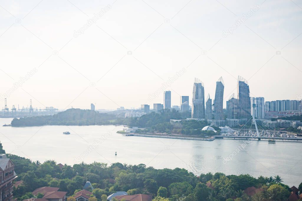 Singapore - 4 Sep 2019: View on Faber Hill, VivoCity, the Marina and the port from the Sentosa cable car, in Singapore