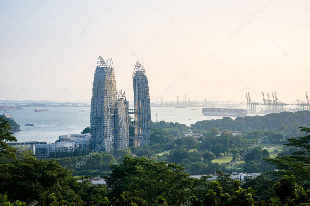 Singapore-4 Sep 2019: a cable car passes over Sentosa island, with views on Faber Hill, VivoCity, the Marina and the port in Singapore.