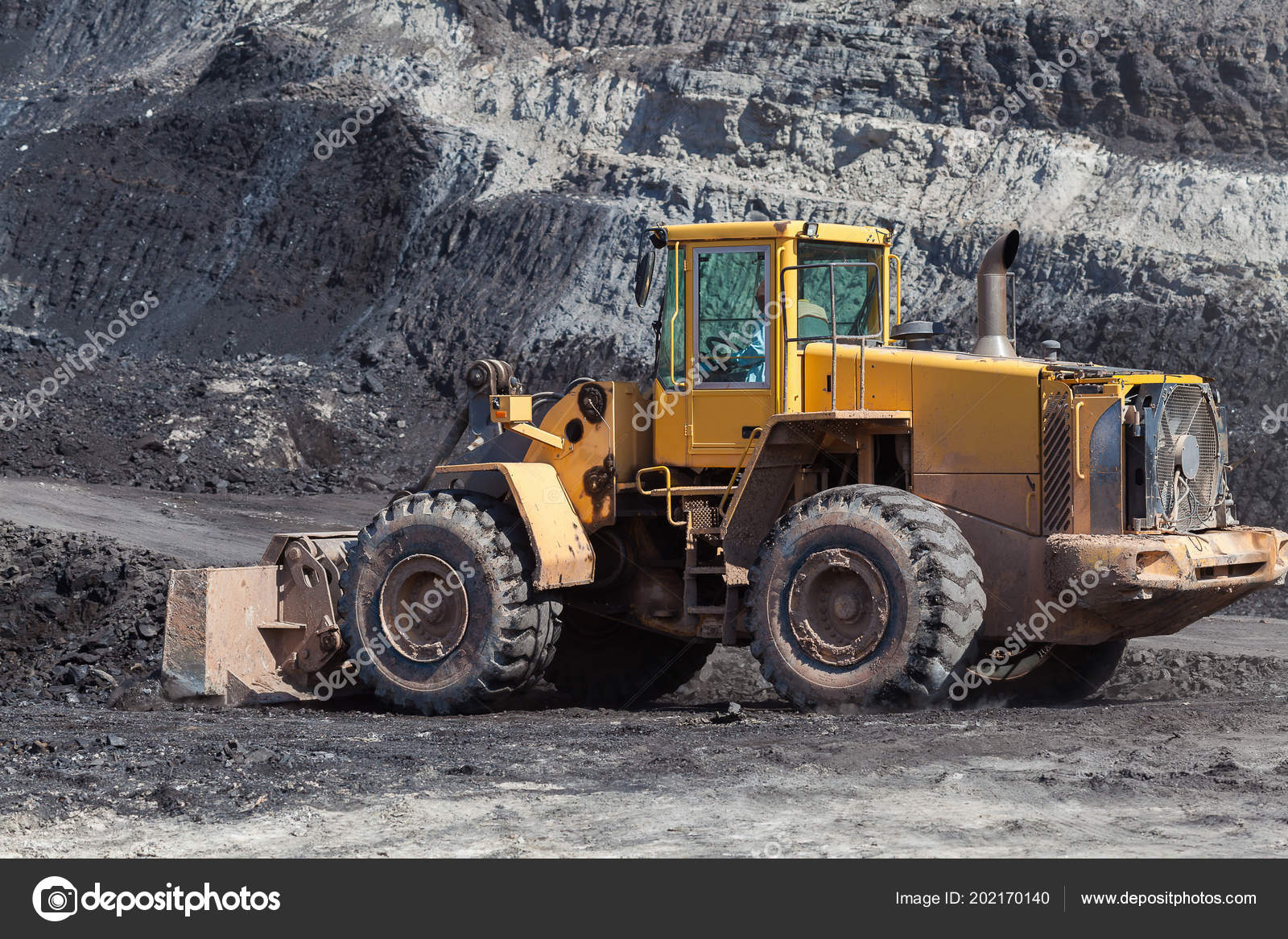 big bulldozer working coal