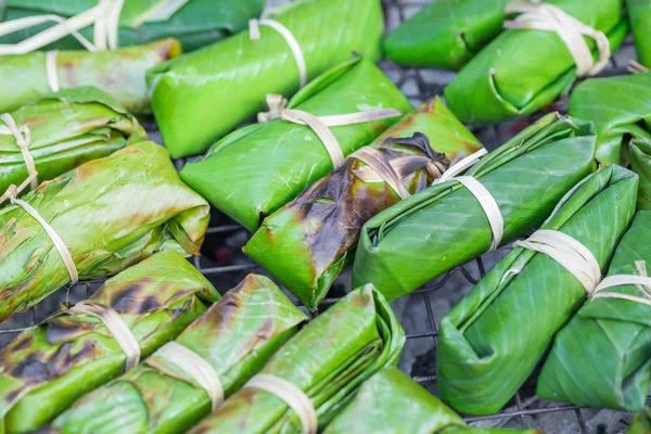 Thai Dessert Grilled Bananas in Sticky Rice made from Green Banana Leaves