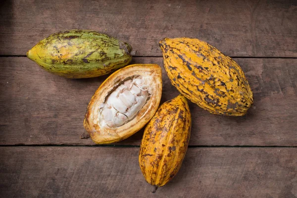 Raw Cacao Pods Wooden Background — Stock Photo, Image