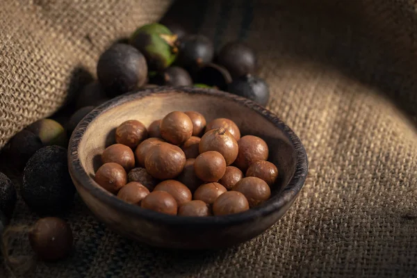 Macadamia Nuts Sackcloth Dark Light — Stock Photo, Image