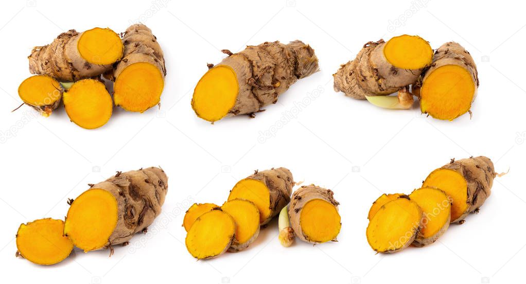 Cutting of turmeric roots isolated on white background.