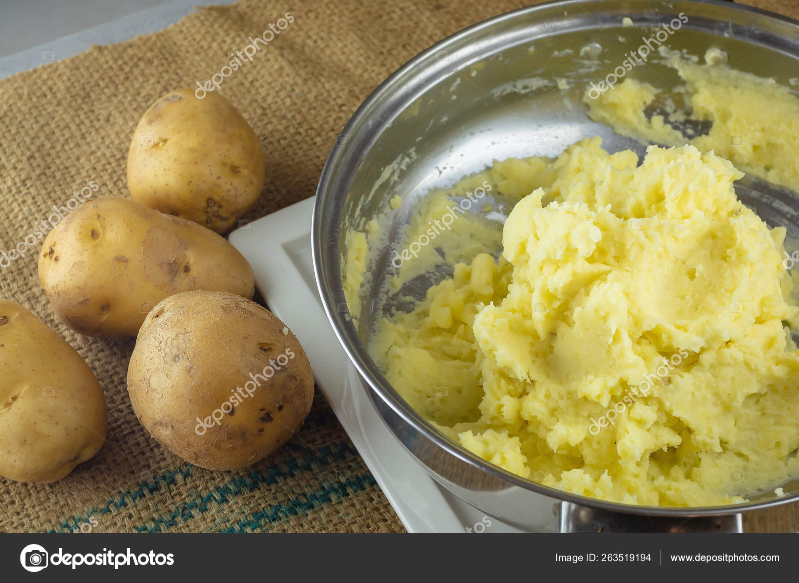 Crushing Boiled Potatoes Potato Masher Stock Photo by