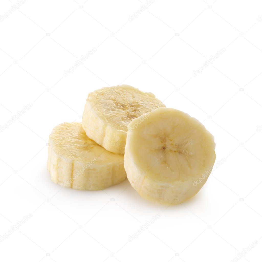 Peeled banana slices isolated over a white background.
