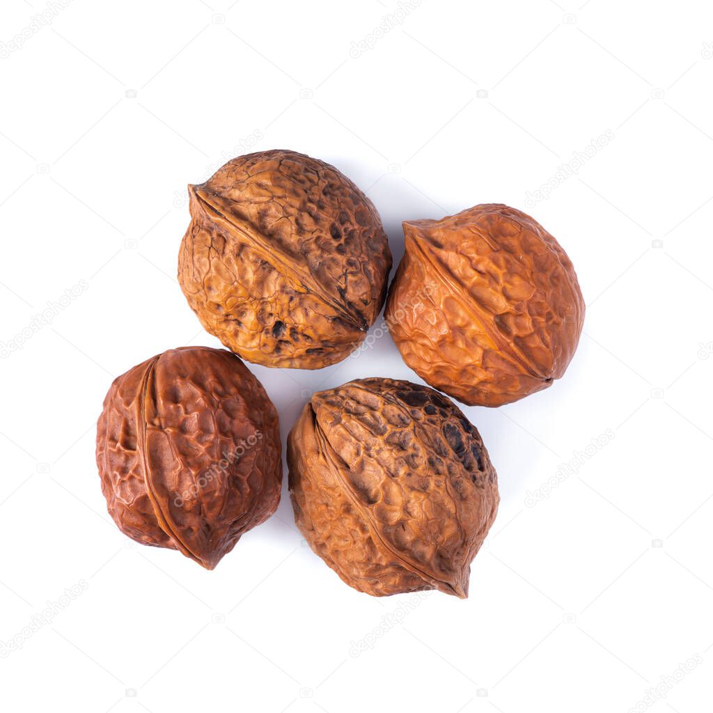 Walnuts kernels isolated over whiye a background.
