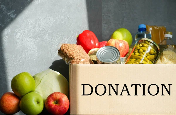 Donation Box Various Food Open Cardboard Box Butter Canned Goods — Stock Photo, Image