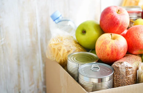 Donation Box Various Food Open Cardboard Box Butter Canned Goods — Stock Photo, Image