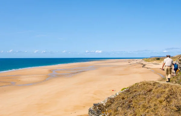 Elderly tourists travel along the Cape Carteret. Barneville-Carteret, Normandy, France