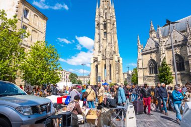 Famous Bordeaux flea market Marche Aux Puces in sunday on Place near Saint Michel basilica, Bordeaux, Aquitaine, France
