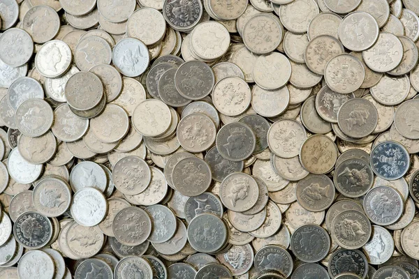 Zbliżenie Wielu Monet Srebra Wielkiej Brytanii Pensów — Zdjęcie stockowe