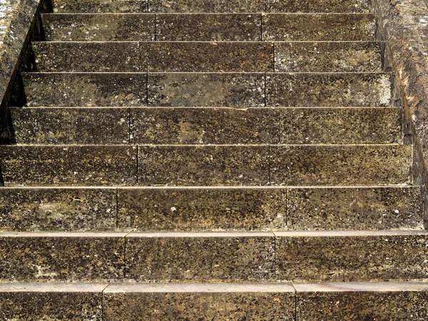 Old stone steps pattern full frame background close up