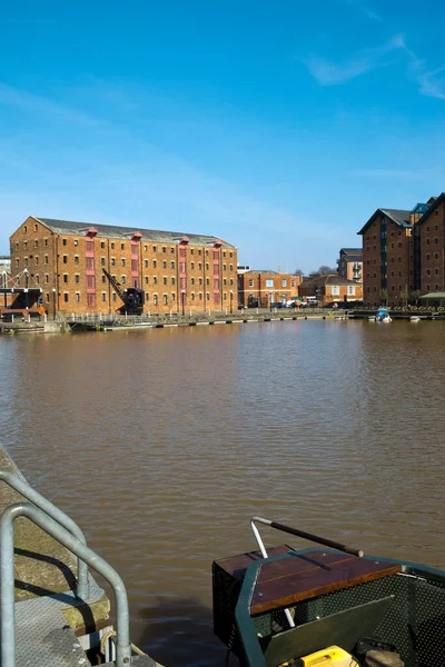 Spring sunshine on the industrial heritage travel destination of Gloucester Docks, Gloucester, UK